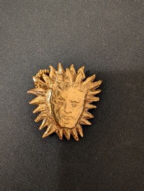 Authentic YSL Sun Face Pendant/Brooch